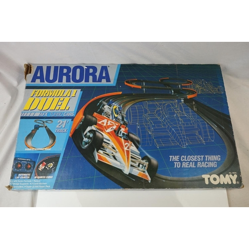 488 - Boxed Scalextric Opel Motorstorm, plus boxed Tomy Aurora Formula 1 Duel and Tomy AFX Drift Action Cu... 