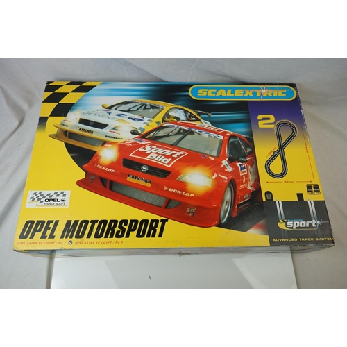 488 - Boxed Scalextric Opel Motorstorm, plus boxed Tomy Aurora Formula 1 Duel and Tomy AFX Drift Action Cu... 