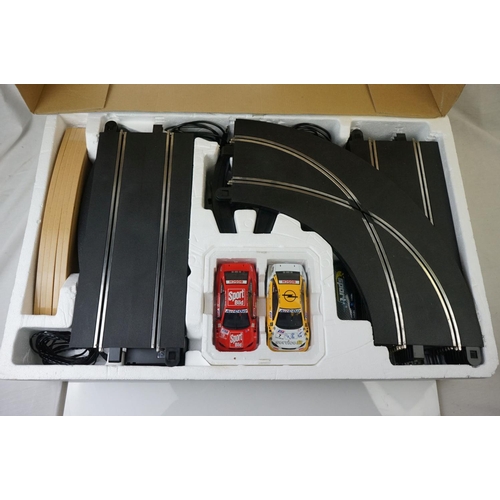 488 - Boxed Scalextric Opel Motorstorm, plus boxed Tomy Aurora Formula 1 Duel and Tomy AFX Drift Action Cu... 