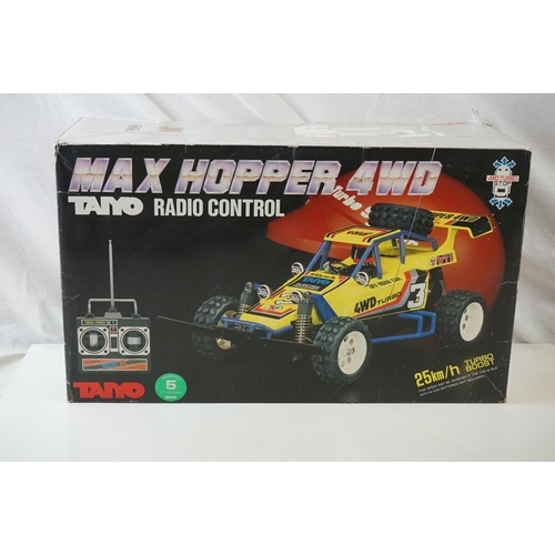 497 - Two boxed remote controlled vehicles to include Taiyo Max Hopper 4WD and Airtech Bladerunner II, plu... 