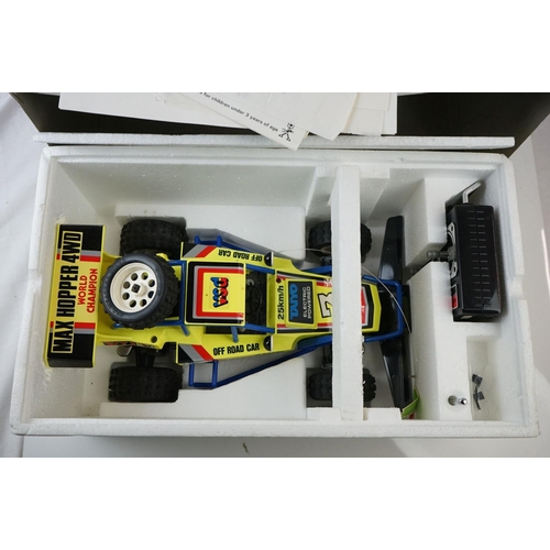 497 - Two boxed remote controlled vehicles to include Taiyo Max Hopper 4WD and Airtech Bladerunner II, plu... 