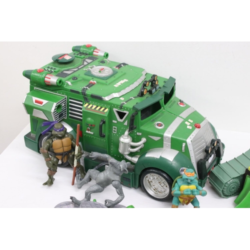 523a - Group of circa 2000's Playmates Teenage Mutant Ninja Turtles to include 9 x figures, and 3 x vehicle... 