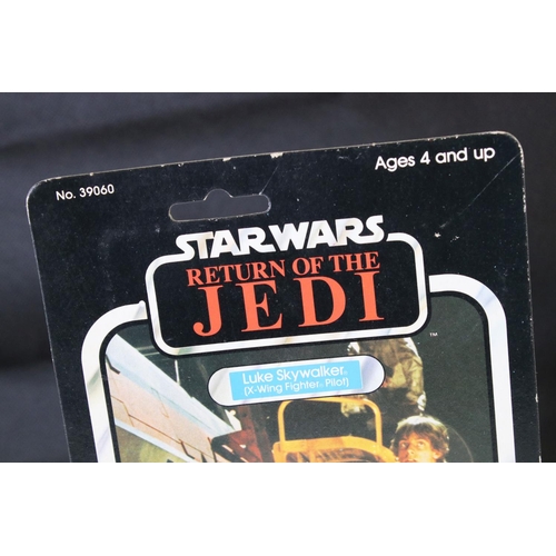 531 - Star Wars - Carded Kenner Return of the Jedi Luke Skywalker X-Wing Fighter Pilot, 77 back, punched, ... 