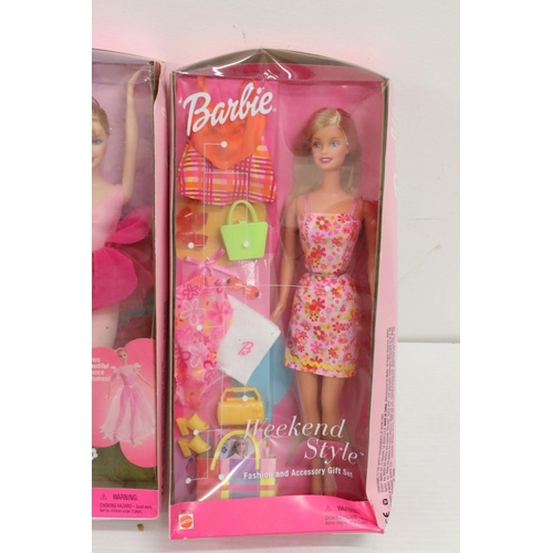 559 - Four boxed Mattel Barbie dolls to include Sunsation 54194, Timeless Silhouette 29050, Weekend Style ... 