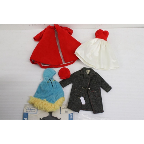 560 - Group of original dolls clothing to include 1963 Mattel Barbie Beach Bandana, Mattel Barbie Ski Quee... 