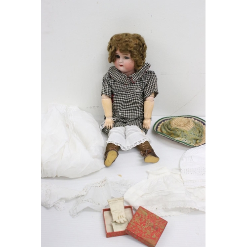 563 - Kammer & Reinhardt bisque headed doll with sleeping glass eyes, teeth, cracking to a thumb, with add... 