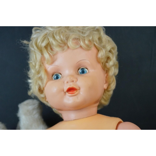 566 - Group of mid to late 20th C plastic dolls and soft toy animals to include Zapf Creation baby, straw ... 