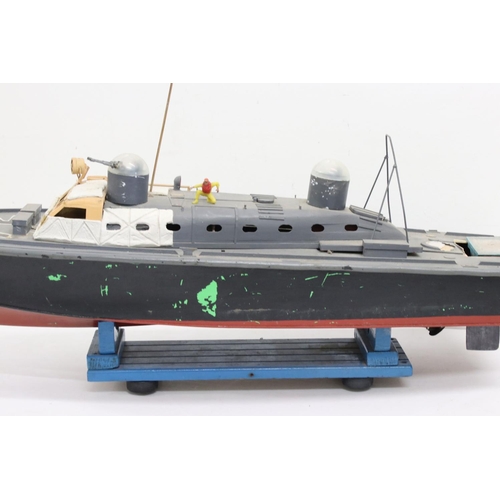 1266 - Scratch built wooden model boat, painted and on stand, showing wear