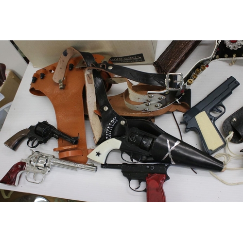 428 - Quantity of vintage toy guns, holsters and accessories to include Lone Star, play wear