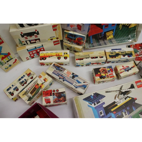 523 - Lego - 21 Boxed 1970s Lego sets to include 645, 648, Legoland Police Station etc, boxes taped up and... 