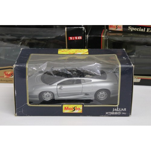 1210 - Eight boxed Maisto diecast models to include 7 x 1:18 scale models featuring Jaguar XK8, Jaguar XJ22... 