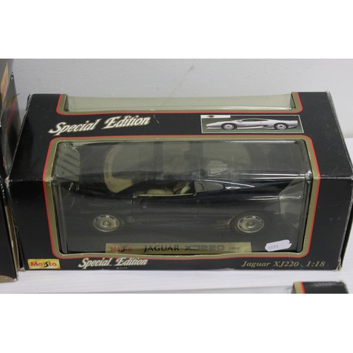 1210 - Eight boxed Maisto diecast models to include 7 x 1:18 scale models featuring Jaguar XK8, Jaguar XJ22... 