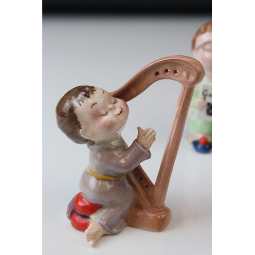 16 - A Beswick Good Night Choir group pianist harpist guitarist and three singers oval back stamp to pian... 