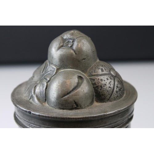 45 - An Antique pewter lidded mould the lid decorated with fruit has removable base which is stamped no 4... 