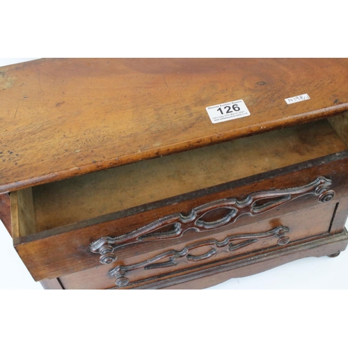 126 - A 19th century continental miniature chest of three long drawers, W: 20cm, H: 45.5cm