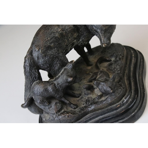 141 - A bronze sculpture of a fox and her cubs signed Fratin.