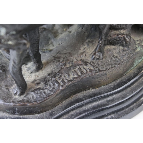 141 - A bronze sculpture of a fox and her cubs signed Fratin.