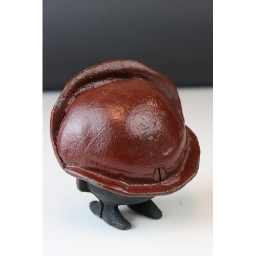 160 - A novelty cast iron money box in the form of a funny man .inscribed Save and Save