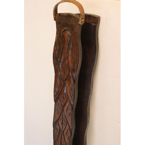 164 - A pair of antique wooden and brass bellows with carved oak leaf decoration.