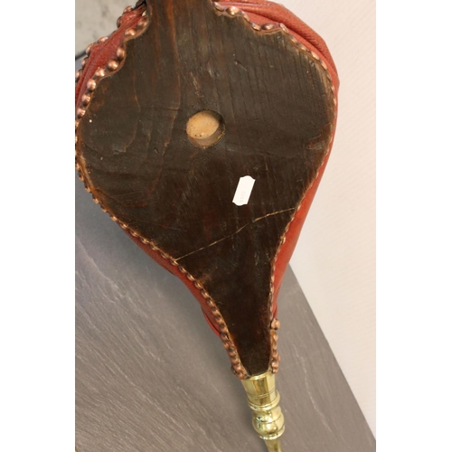 164 - A pair of antique wooden and brass bellows with carved oak leaf decoration.
