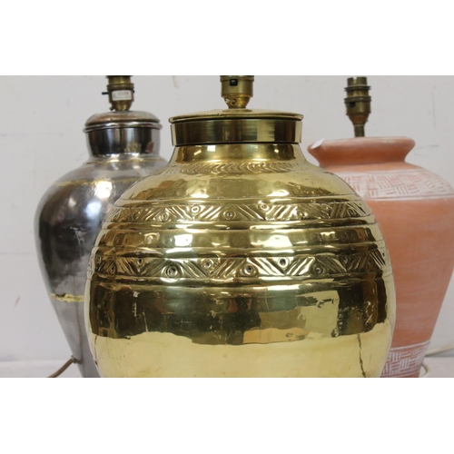 178 - Three large contemporary lamps to include a brass example.