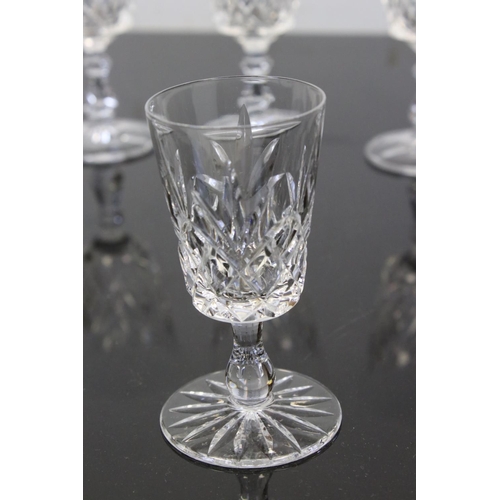 179 - A boxed set of six Stuart Crystal wine glasses together with a quantity of other wine glasses tumble... 