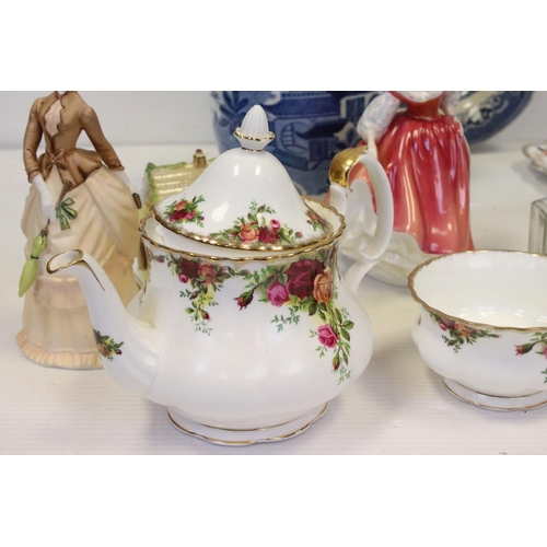 180 - A large box of mixed collectables to include a large quantity of Royal Albert 