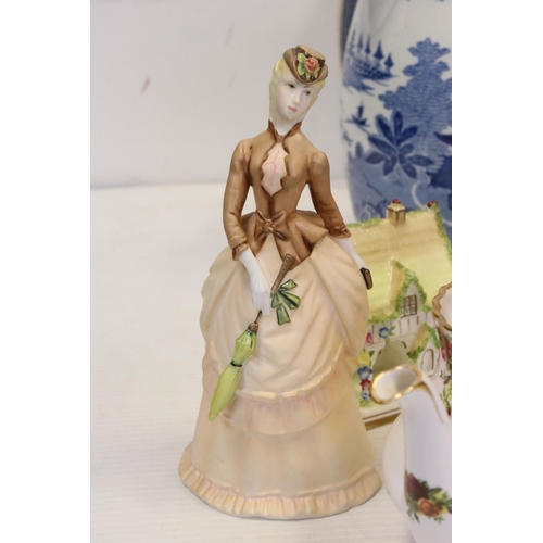 180 - A large box of mixed collectables to include a large quantity of Royal Albert 