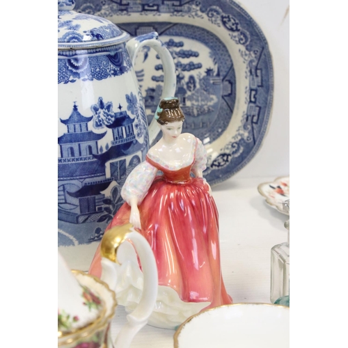 180 - A large box of mixed collectables to include a large quantity of Royal Albert 