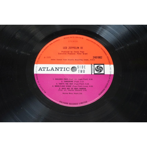 104 - Vinyl - Two Led Zeppelin LPs to include One K40031 and Two K40037, both green/orange Atlantic labels... 