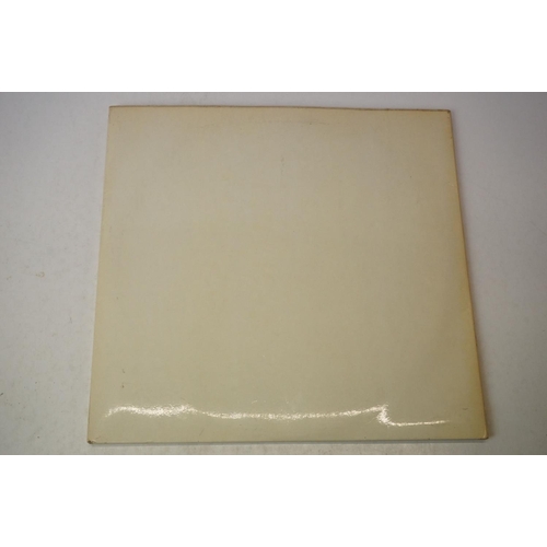 3 - Vinyl - The Beatles White Album (PMC 7067) low number 0052710.  Top loader sleeve is at least VG+ wi... 