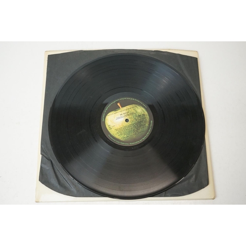 3 - Vinyl - The Beatles White Album (PMC 7067) low number 0052710.  Top loader sleeve is at least VG+ wi... 