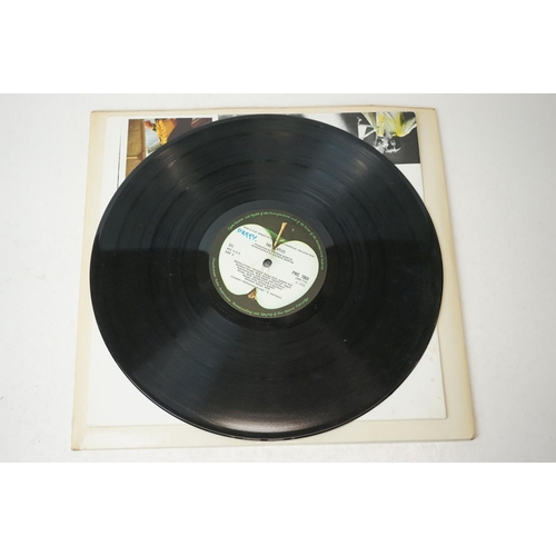 3 - Vinyl - The Beatles White Album (PMC 7067) low number 0052710.  Top loader sleeve is at least VG+ wi... 