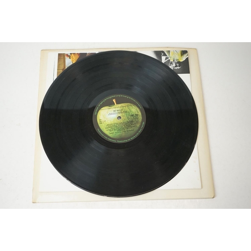 3 - Vinyl - The Beatles White Album (PMC 7067) low number 0052710.  Top loader sleeve is at least VG+ wi... 