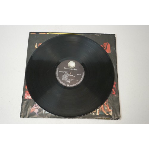 8 - Vinyl - Three Guns n Roses LPs to include Appetite For Destruction with advert insert, and Use Your ... 