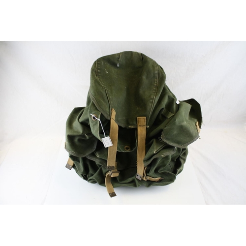 413 - A Vintage Military Rucksack Together With A Military Map Case And Water Bottle.