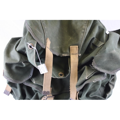 413 - A Vintage Military Rucksack Together With A Military Map Case And Water Bottle.