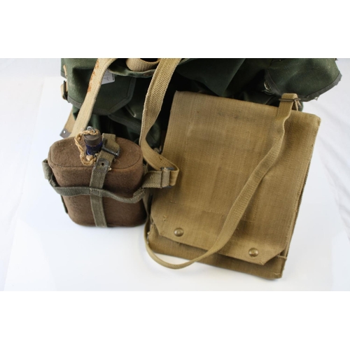 413 - A Vintage Military Rucksack Together With A Military Map Case And Water Bottle.