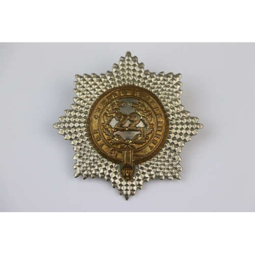 1 - A British 22nd Cheshire Regiment Bi-Metal Pouch Badge With Twin Loop Fixing To Verso.