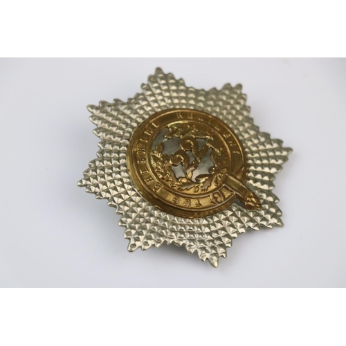 1 - A British 22nd Cheshire Regiment Bi-Metal Pouch Badge With Twin Loop Fixing To Verso.