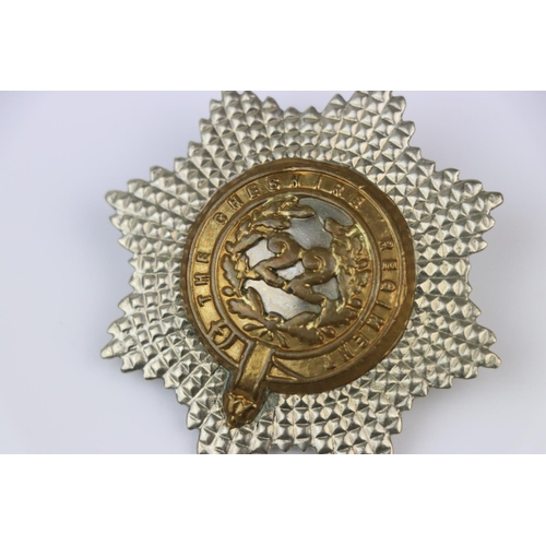 1 - A British 22nd Cheshire Regiment Bi-Metal Pouch Badge With Twin Loop Fixing To Verso.