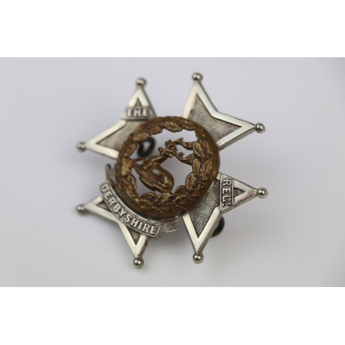 24 - A British The Derbyshire Regiment Bi-Metal Pouch Badge With Twin Loop Fixings To The Verso.