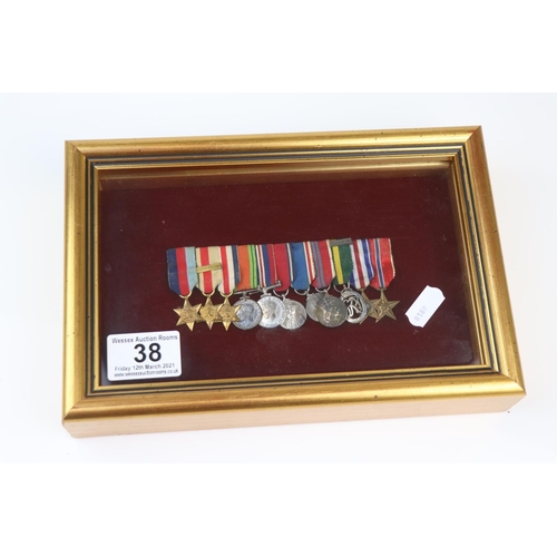 38 - A British World War Two Miniature Medal Group Of Eleven Medals To Include The 1939-45 Star, The Afri... 