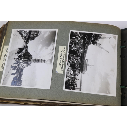 41 - A World War Two Photograph Album Complete With A Large Collection Of Photographs Taken Whilst On Dut... 