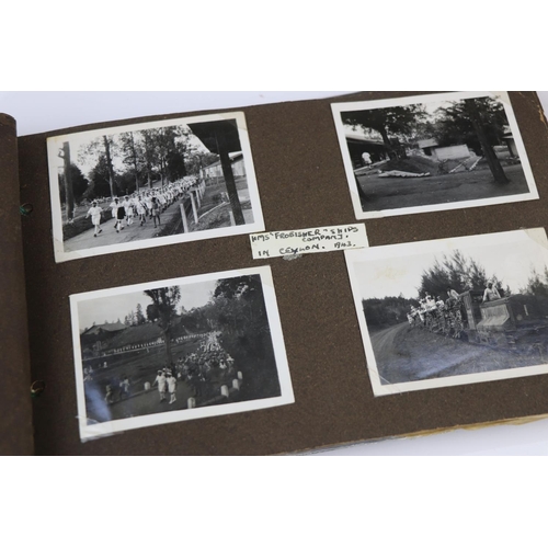 41 - A World War Two Photograph Album Complete With A Large Collection Of Photographs Taken Whilst On Dut... 