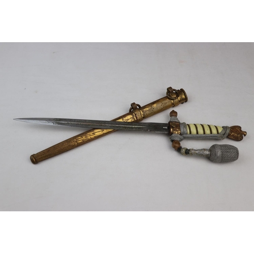 43 - A World War Two German Third Reich Kriegsmarine Officers Dress Dagger, Brass Wire Bound Cellulose Co... 