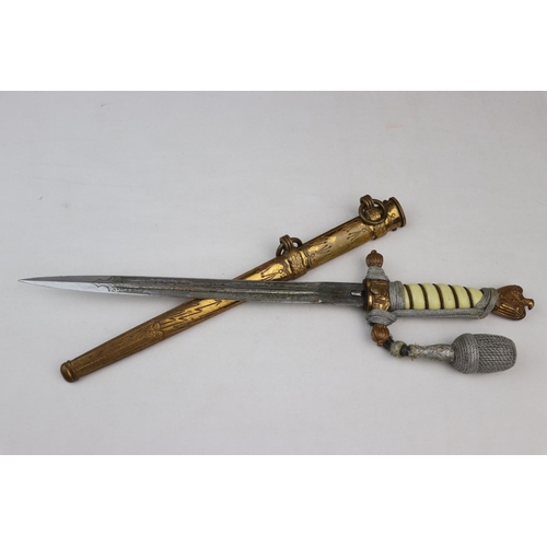 43 - A World War Two German Third Reich Kriegsmarine Officers Dress Dagger, Brass Wire Bound Cellulose Co... 