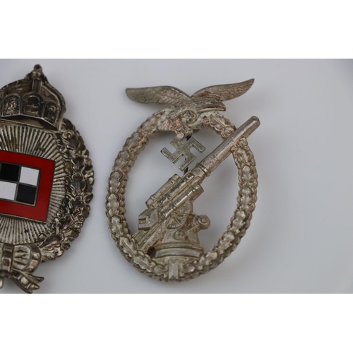 50 - Two Reproduction German Award Badges To Include A World War Two German Luftwaffe Flack Badge And A W... 