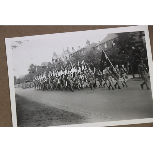 60 - A World War Two German Photograph Album With Contents To Include A Selection Of Photographs Showing ... 