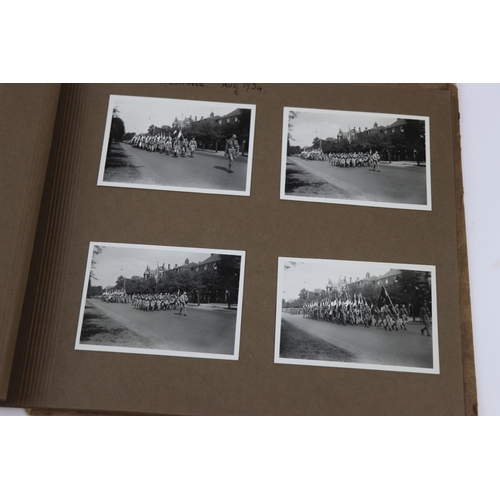 60 - A World War Two German Photograph Album With Contents To Include A Selection Of Photographs Showing ... 